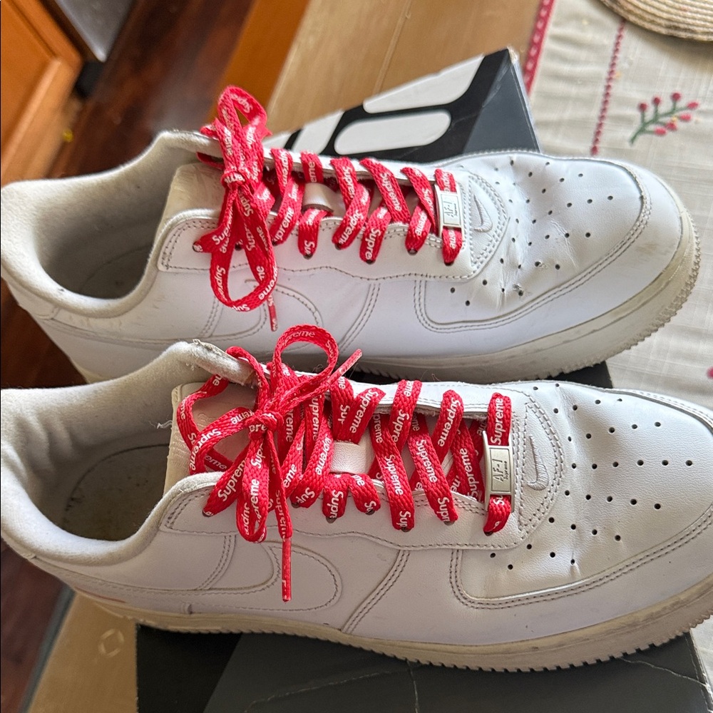 Nike X Supreme White Sneakers with Red Laces